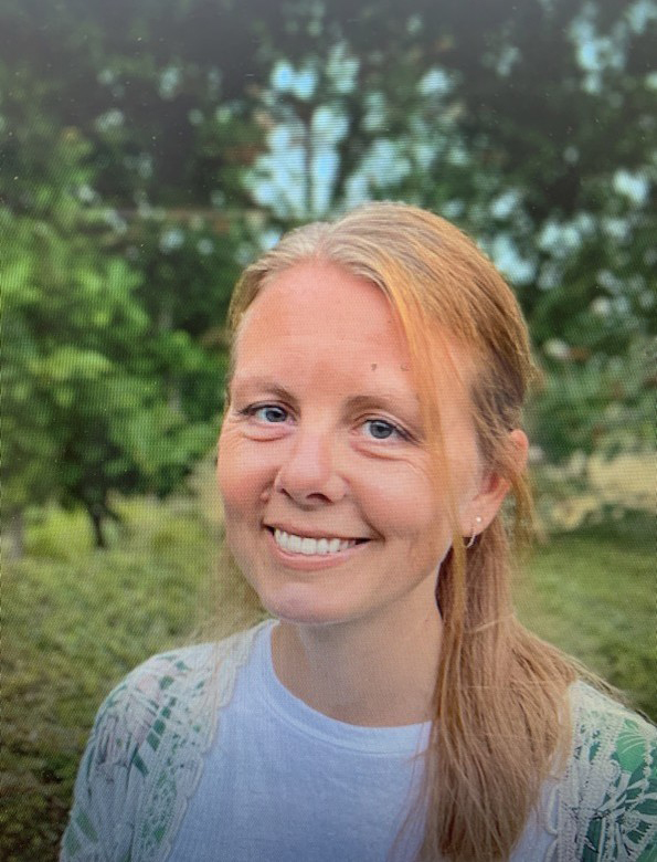 Portrait of Naomi, counsellor at Counselling Connection, smiling outdoors.